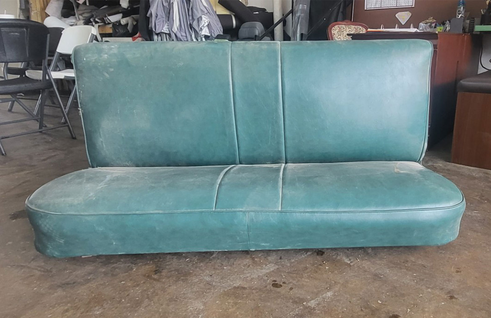 Green couch seating before customization